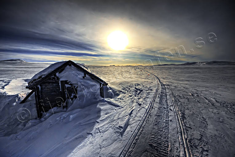 alpine mountains, buildings, communications, land communication, landscapes, Lapland, mountain hut, seasons, snow, snowmobile trails, winter, winter landscape