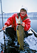 anglers, angling, boat fishing, female, fishing, Gev lake, gevsjring, insjring, reel, spin fishing, trout, trout fishing, winter fishing, woman